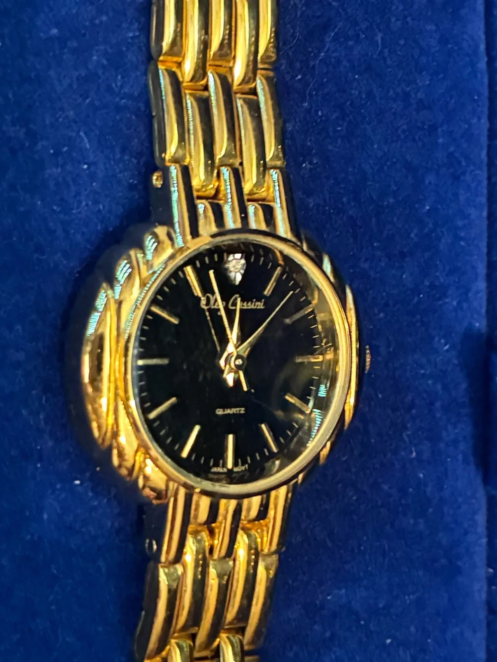 Oleg Cassini Swiss Quartz & Diamond Watch with Gold Tone Basket Weave Band
